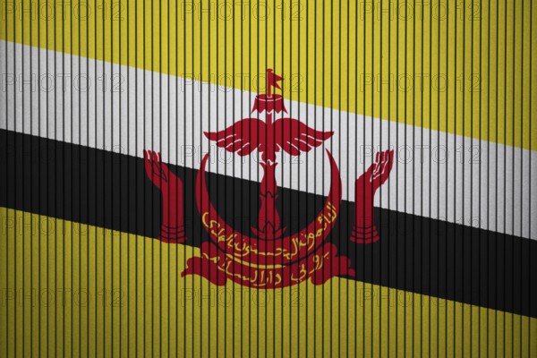 Brunei flag painted on the cracked grunge concrete wall