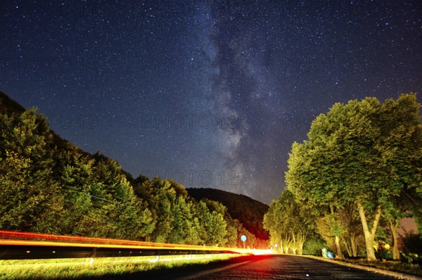 Milky Way galaxy on the side of the highway near Ulm with car trails