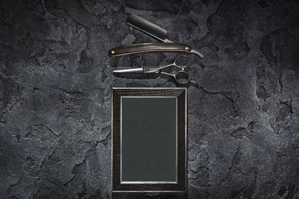 Black Stright Razor Scissors And Empty Frame In Barbershop Concept On Stone Slate Background