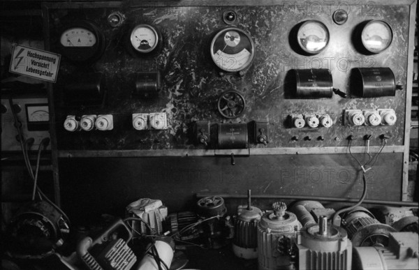 Germany, Berlin, 27 April 1992, Elektromaschinen - und Ankerwicklerei, Bernd Kerber, Electrical panel, Caution high voltage, Europe