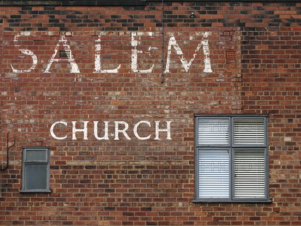 Leeds, west yorkshire, 17 June 2021: old painted sign on the historic salem chapel as the oldest surviving chapel in the city and the birthplace of leeds united football club