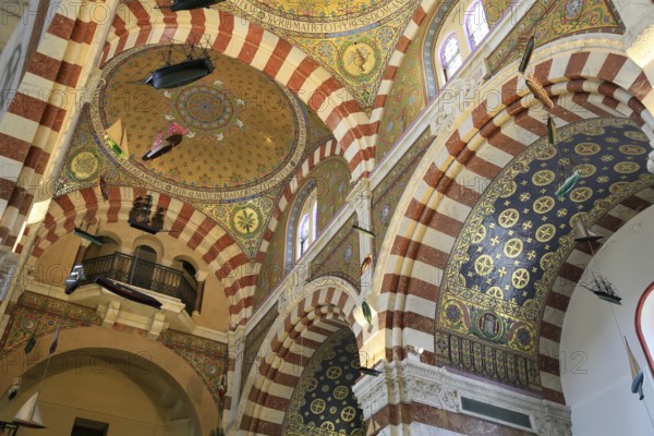 Domes with mosaics, neo-Romanesque-Byzantine Marian pilgrimage church Basilica Notre Dame de la Garde, also known as La Bonne Mere, Marseille, Bouches du Rhone department, Provence Alpes Cote d'Azur region, France, Mediterranean Sea, Europe