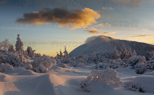 Sniezka peak in winter at sunrise. Karkonosze National Park, Poland, Europe