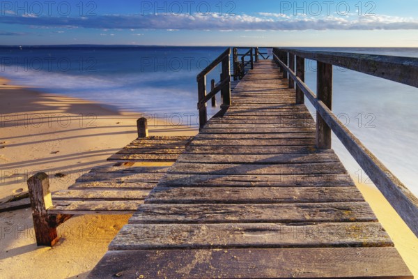 Piers near Millionaire's Walk at Point King Beach on a cool winter's morning at sunrise on the Mornington Peninsula in Sorrento, Victoria, Australia, Oceania