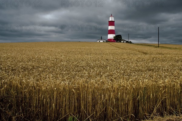 HAPPISBURGH, NORFOLK, UK - AUGUST 6 : Storm approaching the Lighthouse at Happisburgh in Norfolk on August 6, 2008