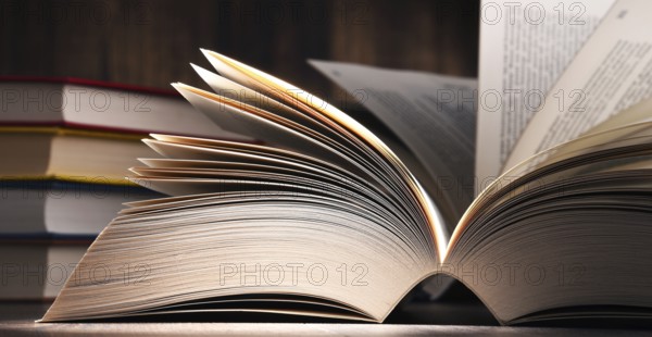 Composition with open book on the table