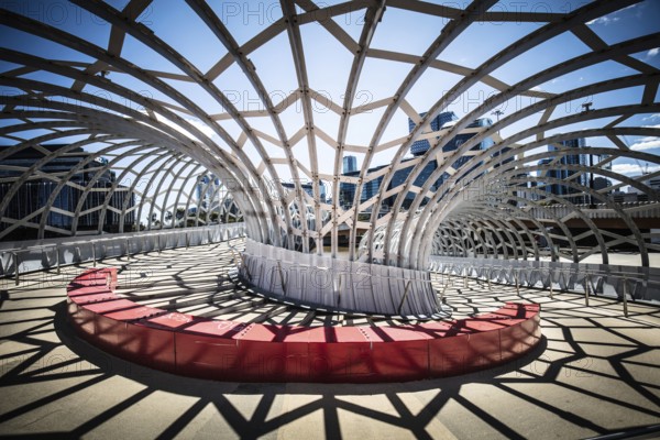 The iconic architecture of Webb Bridge on a warm spring morning in the Docklands area of Melbourne, Victoria, Australia, Oceania
