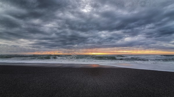 A very colorful and dramatic sunset over the Pacific Ocean