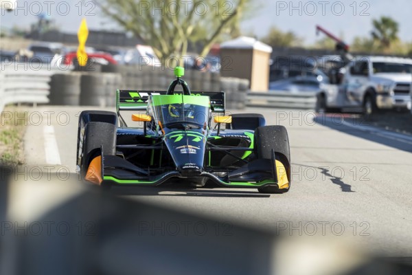 ROMAIN GROSJEAN (77) of Geneva, Switzerland comes off pit road during a practice session for the Inaugural Thermal Club $1 Million Challenge at The Thermal Club in Thermal, CA