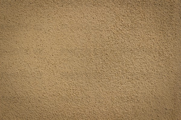 Orange wall background and texture with vignetting and blank copyspace for text or advertising