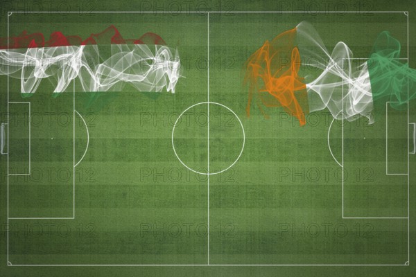 Hungary vs Ivory Coast Soccer Match, national colors, national flags, soccer field, football game, Competition concept, Copy space