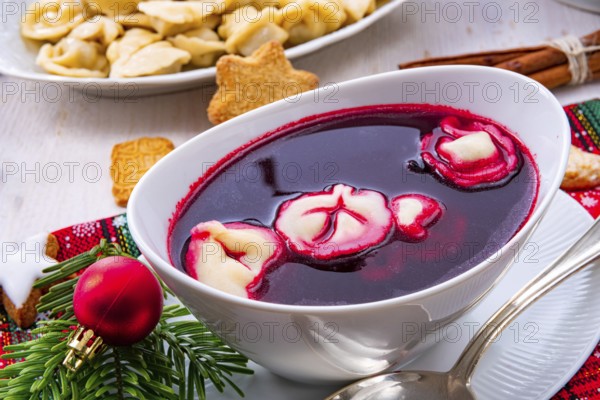 Barszcz (beetroot soup) with small pierogi