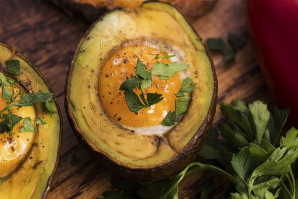 Homemade Organic Egg Baked in Avocado with Salt and Pepper