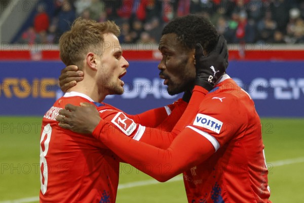 Football, Bundesliga 1, Matchday 26, 2024/2025, 1. FC Heidenheim vs. Holstein Kiel, 16.03.2025, Voith-Arena, Heidenheim, Germany, Leo SCIENZA (1. FC Heidenheim, 08) celebrates with Sirlord CONTEH (1. FC Heidenheim, 31) the 3 to 1 and thus the victory, Europe
