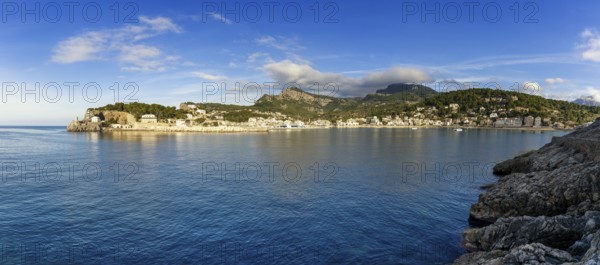 A panorama view of the natural bay and harbour of Port de Soller in northern Mallorca