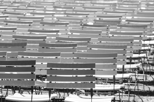 White chair rows in a spa park in Black & White dark