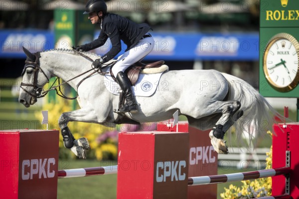 Irish rider Darragh Kenny riding VDL Cartello competes in the second round and jumpoff of the CPKC International GP at Spruce Meadows Masters, in Calgary, Alberta, Canada, North America