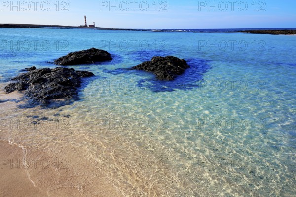 El Cotillo beach and Toston lighthouse at Fuerteventura Canary Islands