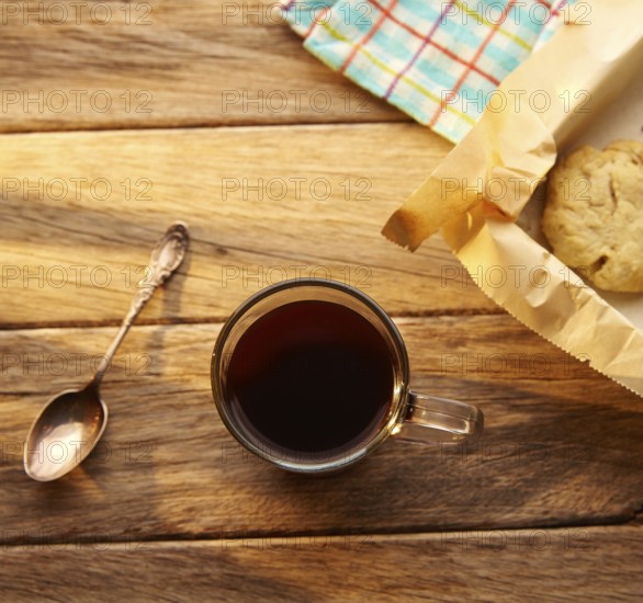 Coffee with cookies biscuits homemade on vintage wood table