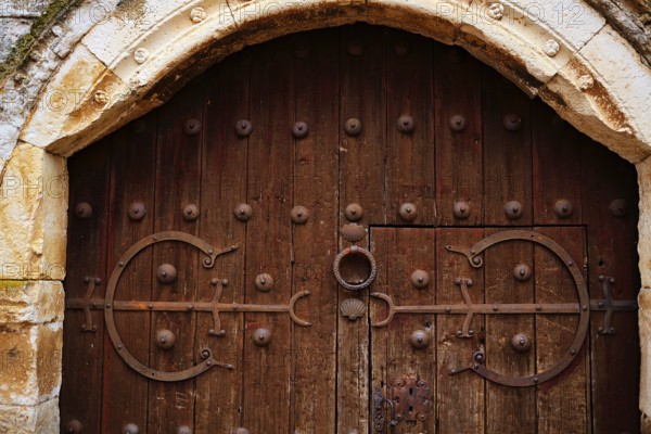 Zamora detail of old aged wood door in Spain by the via de la Plata way