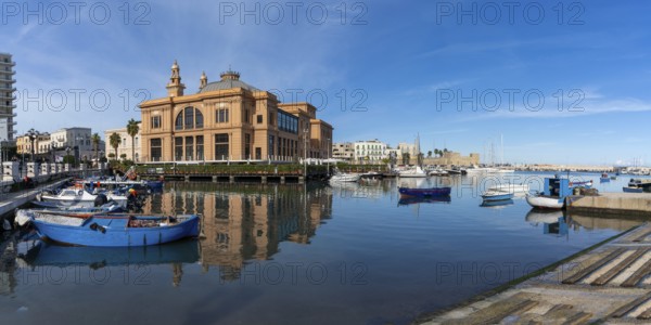 Bari, Italy, 27 November, 2023: view of the historic Teatro Margherita building and fishermen harbour in Bari Vecchio, Europe