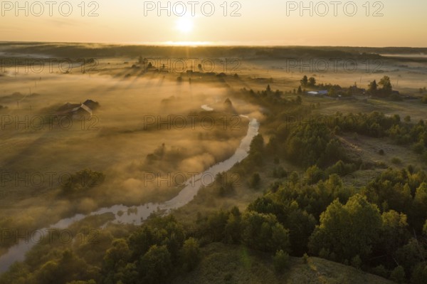 Sunset aerial atmospheric view on river in Ural Russia. Drone photography