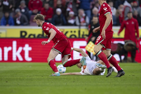 (DFL/DFB REGULATIONS PROHIBIT ANY USE OF PHOTOGRAPHS AS IMAGE SEQUENCES AND/OR QUASI-VIDEO) Cologne, RheinEnergieStadion, North Rhine-Westphalia, Josh Knight (defence, Hannover 96, #2), Leart Pacarada (1.FC Köln, defence, #17), 2nd Bundesliga, 1.FC Köln, Hannover 96 on 30.11.2024 at RheinEnergieStadion in Cologne Germany