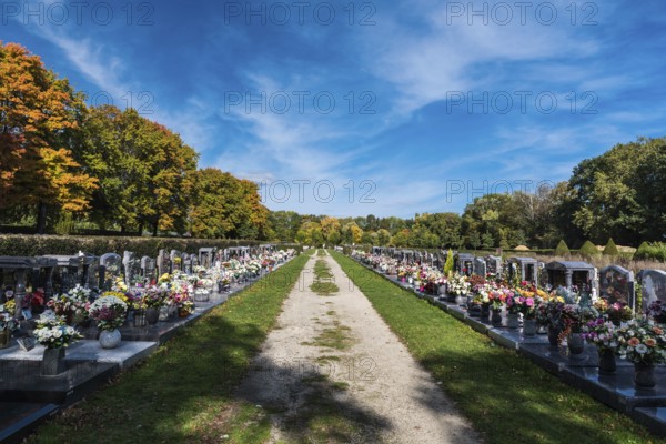 Anderlecht, Brussels, Belgium, 10 11 2018: Decorated grave yards on a cemetery against blue sky, Europe