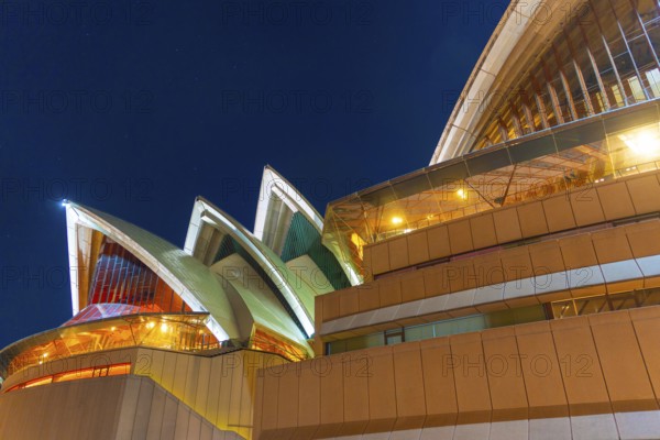 Opera house shining night view. Shooting Location: Australia, Sydney