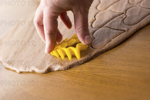 Preparing easter gingerbread cookies. Steps of making pastry