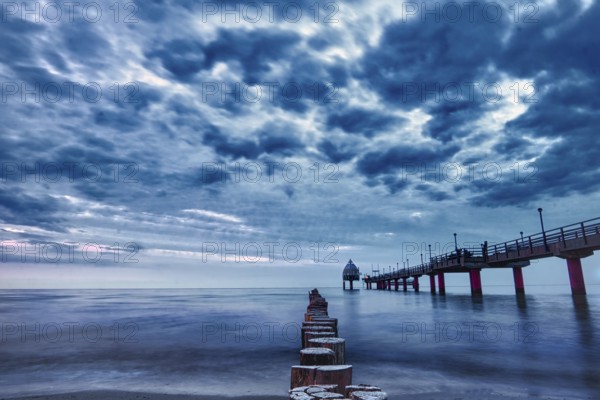 The pier in Zingst at blue hour with a long exposure. A torist attraction. Beautiful and pure relaxation