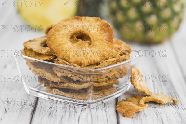 Some homemade Dried Pineapple Rings as detailed close-up shot, selective focus