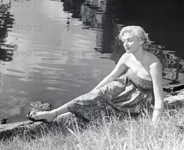 Anita Ekberg. Born 29 September 1931, died 11 January 2015. Swedish actress. When the picture is taken, she has won the Miss Sweden beauty contest on August 24, 1951. Anita has been awarded the title Miss Sweden through a vote in the weekly magazine Veckorevyn, where 1100 girls competed for the title in 28 Swedish cities and 125, 000 voters. Along with the award, she also received a trip to the USA where she will visit the city of Atlantic City where Miss America is usually crowned, as well as Texas. She is 20 years old at this time, a native of Malmö and a model by profession. 1951. Kristoffersson ref BD41-8