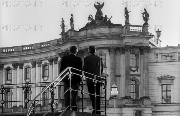 Germany, Berlin, 19 May 1991, two men looking at the chest of drawers, Bebelplatz, Deutsche Staatsoper unter den Linden, Europe