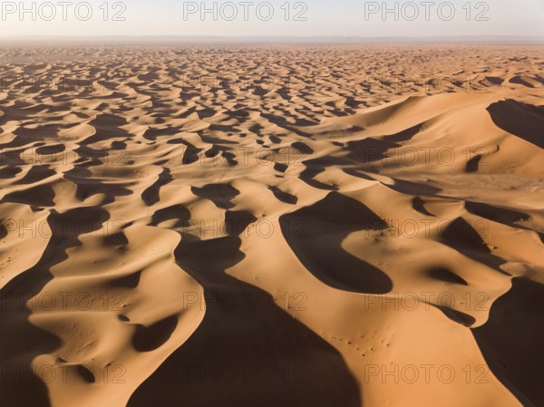 Beatiful aerial landscape with big sand dunes in Sahara desert at sunrise
