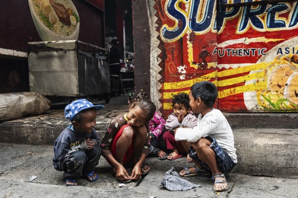 Poor street children at Analakely Market Antanarivo, Madagascar, Africa
