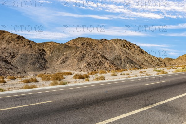 Asphalted road through mountains in egyptian desert