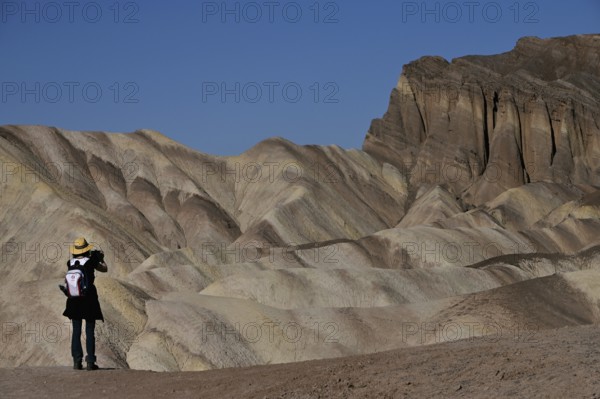 Hikers at Zabriskie Point in Death Valley National Park, California, USA, North America