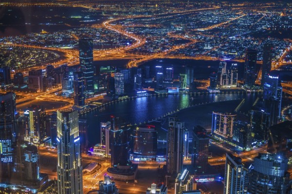 Dubai night view seen from the observation deck of Burj Khalifa. Shooting Location: Dubai