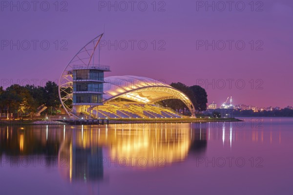 PUTRAJAYA, MALAYSIA - January 02, 2016 : Water Sport Center, located at Putrajaya, Malaysia, captured in beautiful night scene with purple sky, Asia