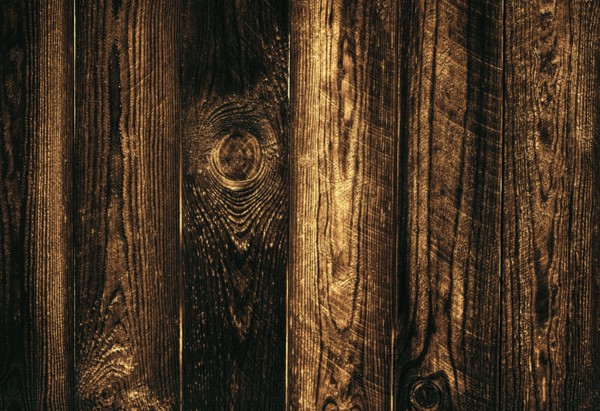 Wooden dark texture of boards close-up