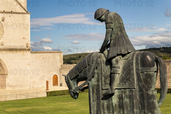 St. Francis of Assisi Church with the statue of St. Francis on a horse in the foreground. Francis is the patron saint of Italy. The bell tower can be seen from miles away