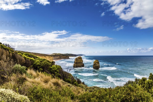 Rocks of the coastal strip of the Twelve Apostles. The Great Ocean Road. The morning on the Pacific coast near Melbourne. Travel to Australia. The concept of active and phototourism