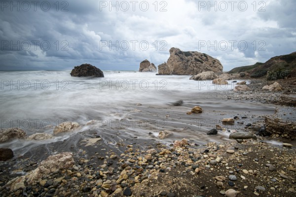 Seascape with windy waves during stormy weather at the rocky coastal area of the Rock of Aphrodite in Paphos area, Cyprus, Europe