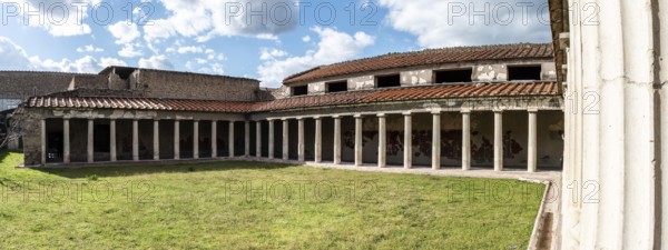 OPLONTIS, ITALY, MAY 03, 2022, Garden and colonnade of the ancient Roman Villa Oplontis near Pompeii, Italy, Europe
