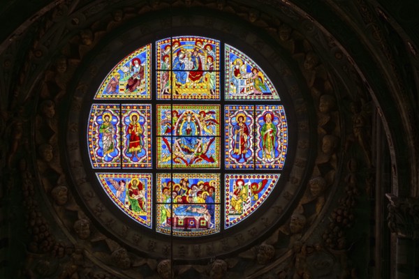 SIENA, ITALY, SEPTEMBER 23, 2023, Rich ornate window with mother mary above the presbytery of the Siena cathedral in Italy