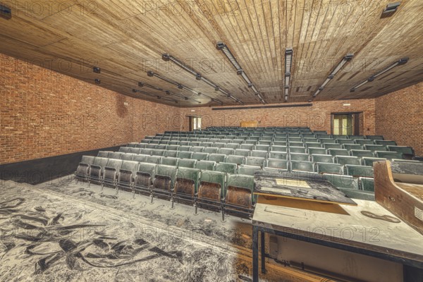 Dilapidated lecture theatre, its floor covered with rubble and dust, Institute of Molecular Biology, Lost Place, Sint-Genesius-Rode, Province of Flemish Brabant, Belgium, Europe