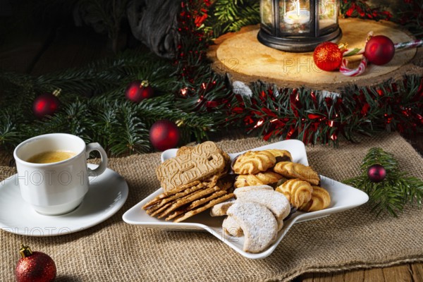 Different types of biscuits with rustic Christmas decorations