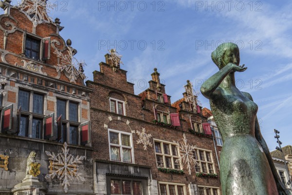Historic buildings and statue in an old town centre with architectural details, nijmegen, waal, gelderland, netherlands