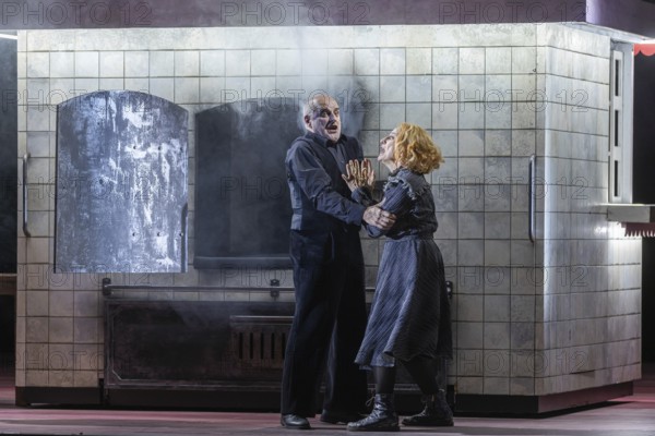 BERLIN, Germany - November 2024: Sweeney Todd (The Demon Barber of Fleet Street) - A musical thriller (1979) in a co-production with the Opéra national du Rhin with music by Stephen Sondheim in a production by Barrie Kosky based on the play of the same name by Christopher Bond. Sweeney Todd, an innocent barber, is falsely arrested and loses his woman and daughter. After years of imprisonment, he returns to London to take revenge on those responsible. Together with the baker Mrs Lovett, he murders his customers and turns their meat into pies, which she sells in her shop. Their murderous partnership unleashes a bloody vicious circle that ultimately leads to tragic consequences for everyone involved. Media rehearsal on 13.11.2024 at the Komische Oper in Berlin Performers: Sweeney Todd: Christopher Purves Mrs Nellie Lovett: Dagmar Manzel Anthony Hope: Hubert Zapiór Johanna Barker: Alma Sadé Tobias Ragg: Tom Schimon Richter Turpin: Jen